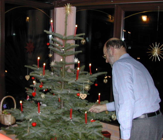Dad lights Christmas tree, Plymouth 